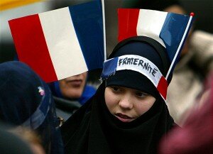 YOUNG MUSLIM PROTESTER SEEN DURING STREET PROTEST OF SIKHS AGAINST FRENCH BAN ON RELIGIOUS SYMBOLS IN STATE SCHOOLS IN PARIS